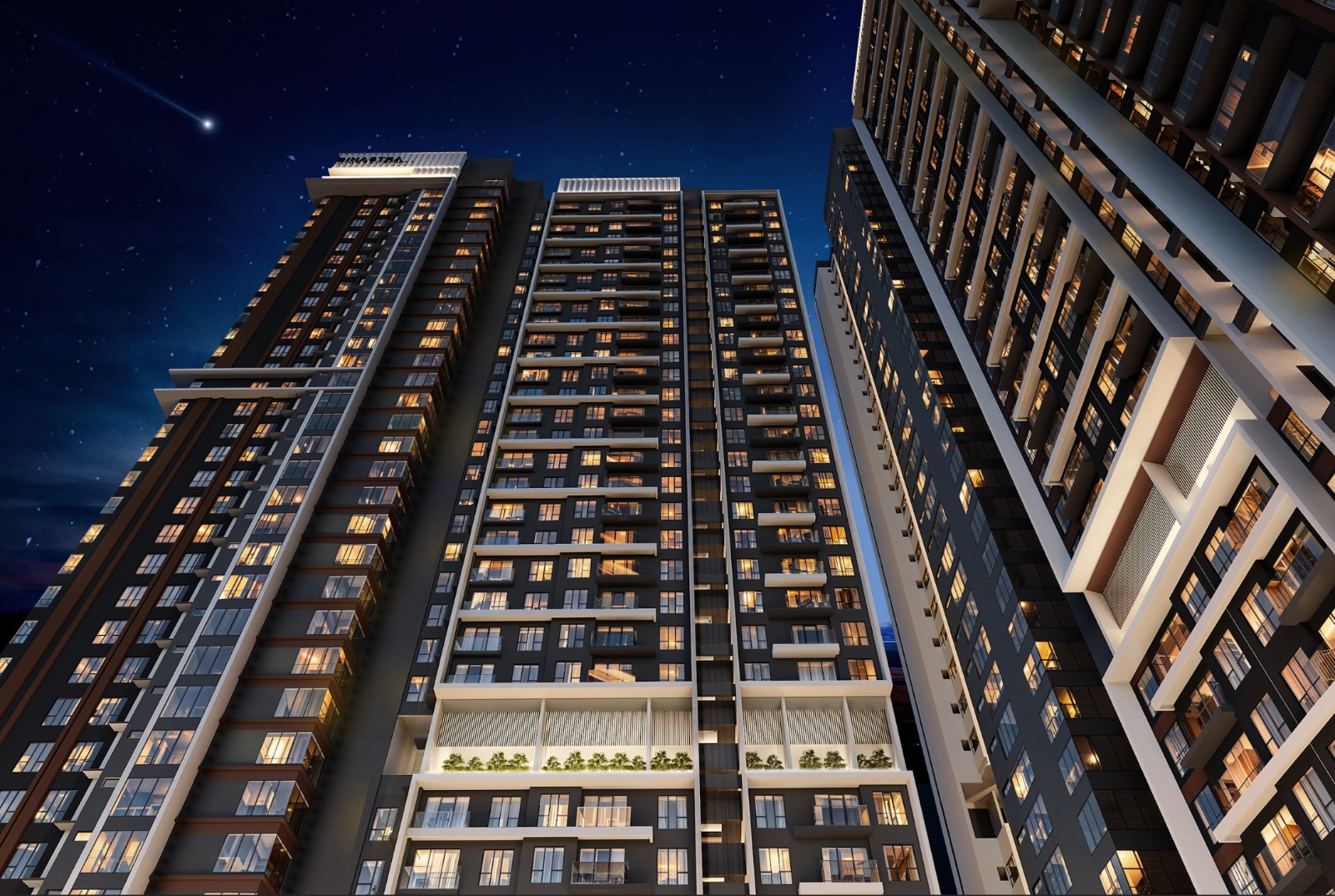 Binastra Cochrane twin towers illuminated at night, viewed from the podium base